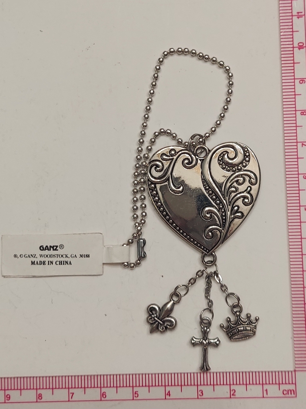 GANZ Silver-Tone Filigree Heart Necklace with Fleur, Cross & Crown Charms
